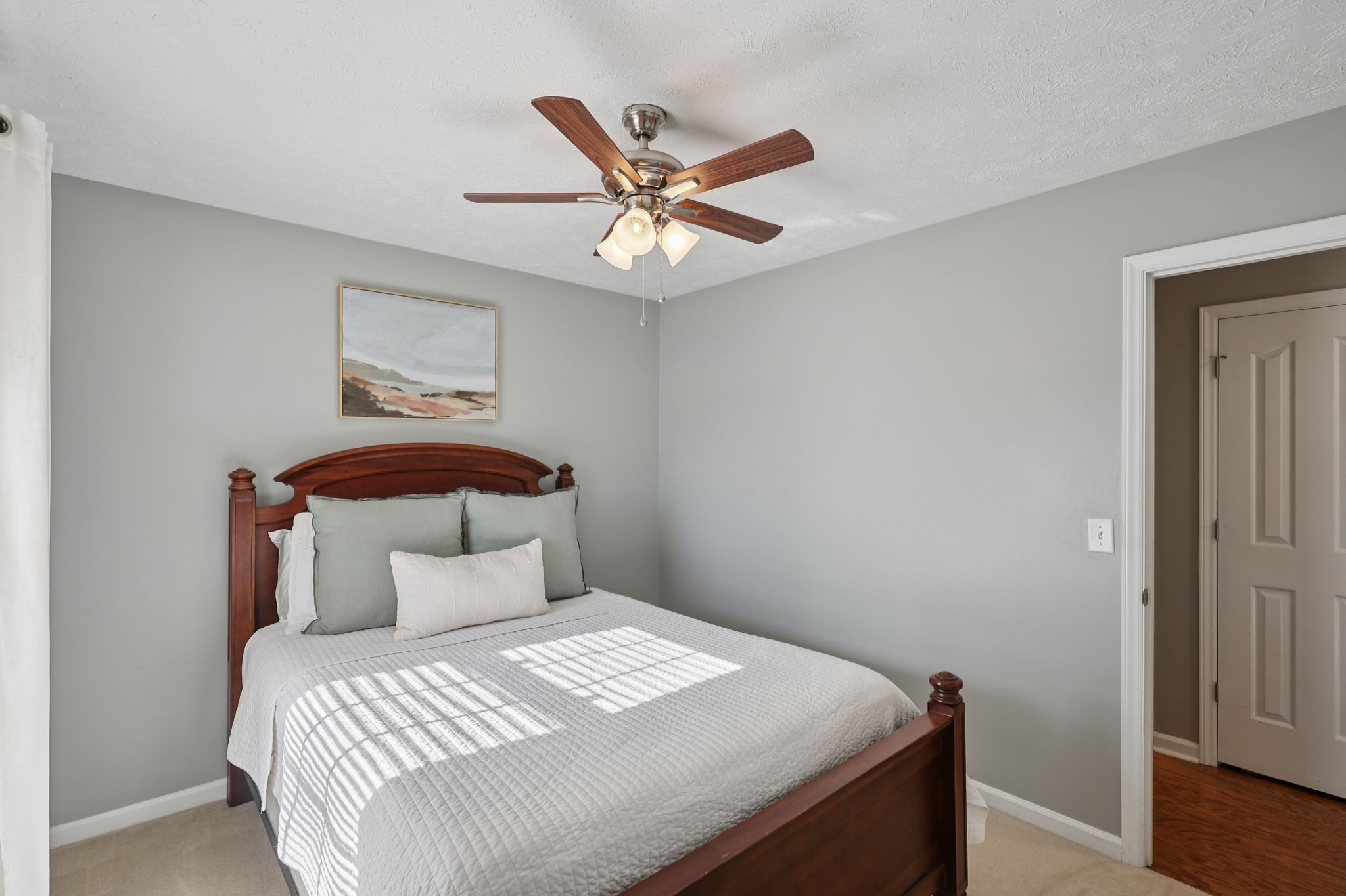 403 Acorn Court Smyrna, TN 37167 - Photo 20 of 34 a bedroom with a bed and a ceiling fan