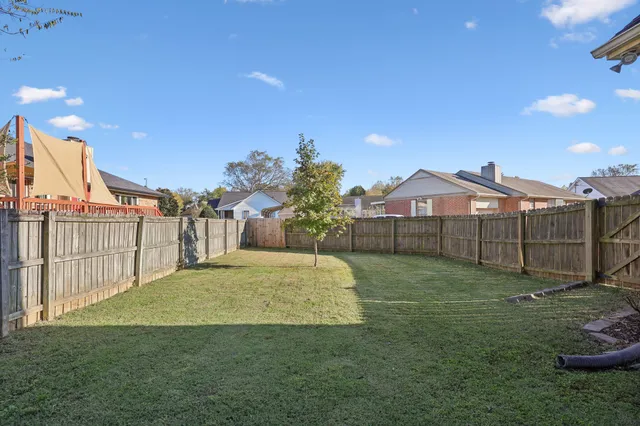 a view of outdoor space and yard