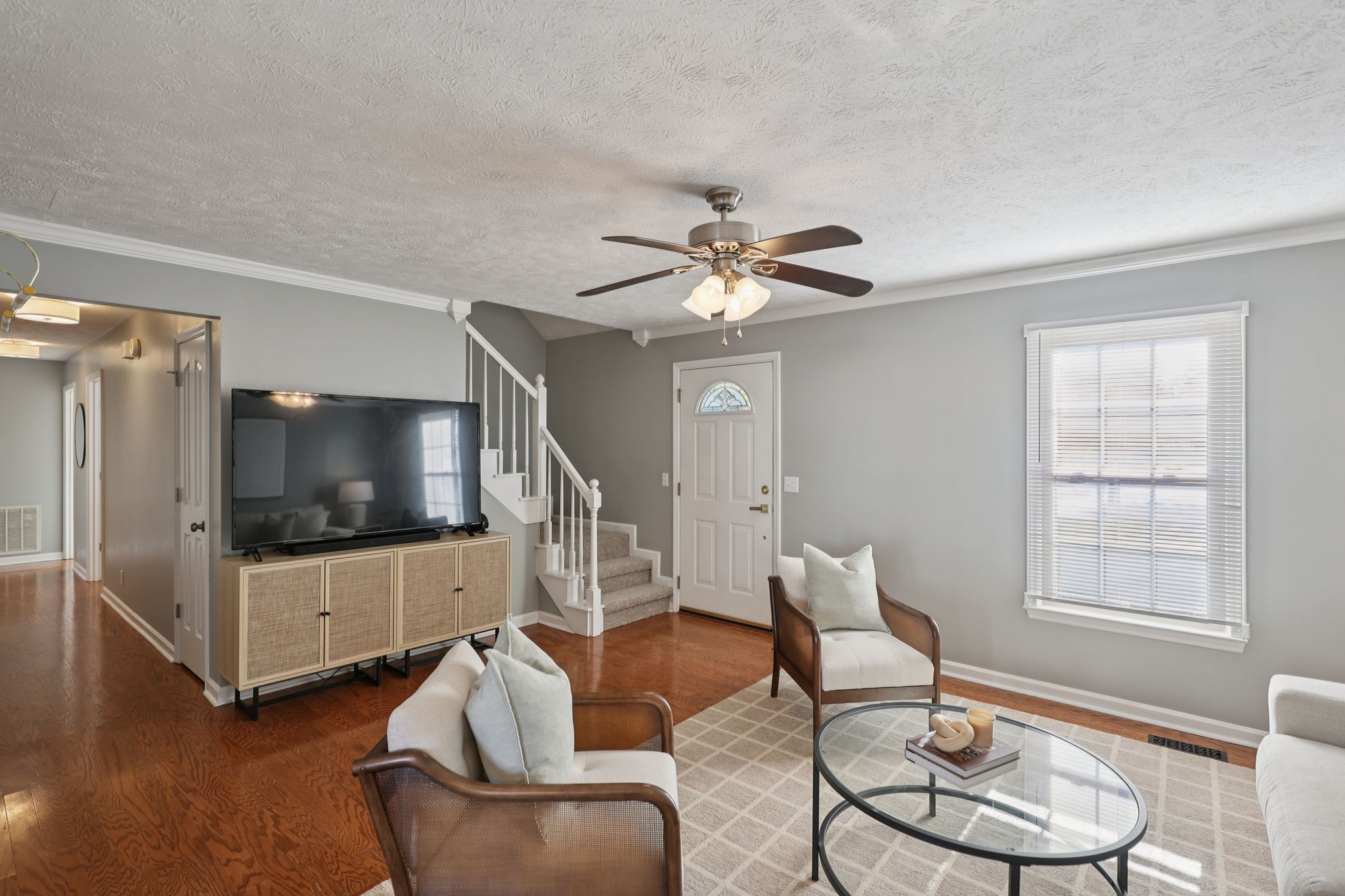 403 Acorn Court Smyrna, TN 37167 - Photo 8 of 34 a living room with furniture and a flat screen tv