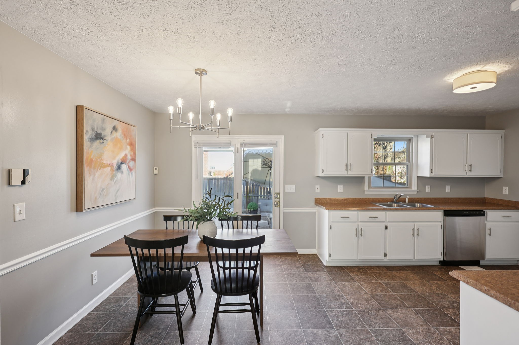 403 Acorn Court Smyrna, TN 37167 - Photo 9 of 34 a view of a dining room with furniture and chandelier