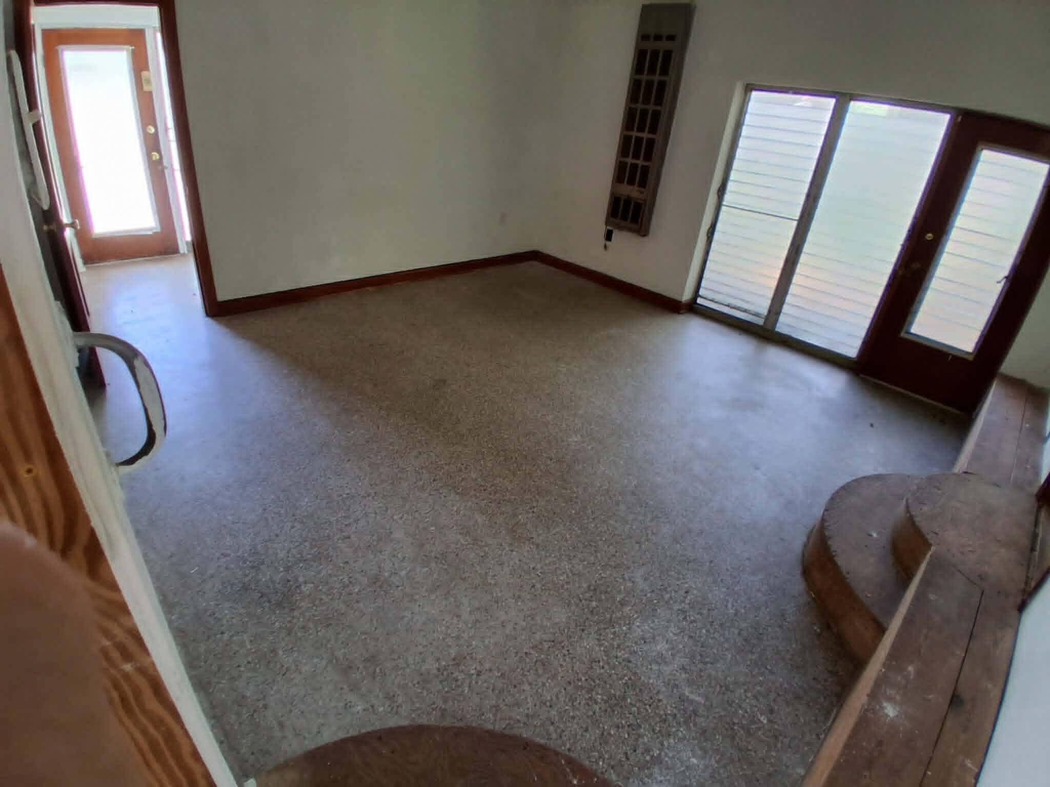 855 North Pearl Street Crestview, FL 32536 - Photo 22 of 31 a view of room with window and wooden floor