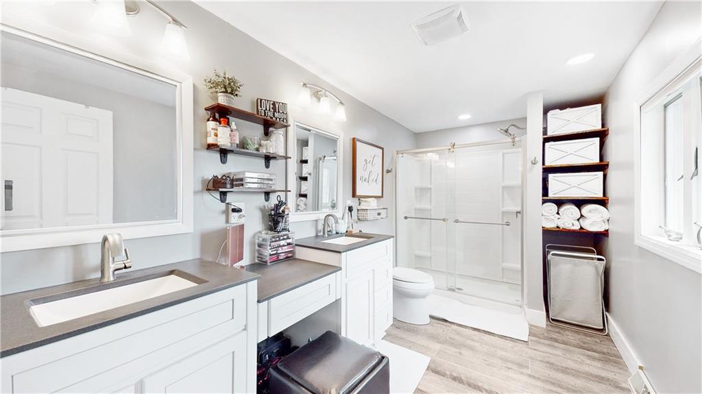 364 Ridge Avenue Canonsburg, PA 15317 - Photo 13 of 25 The gorgeous master bath with double bowl vanity and walk in closet with tile floor and shelving.