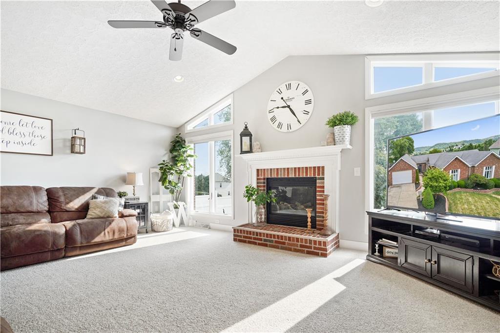 364 Ridge Avenue Canonsburg, PA 15317 - Photo 6 of 25 Another view of the family room with the gas fireplace and those beautiful windows that let in so much natural light!