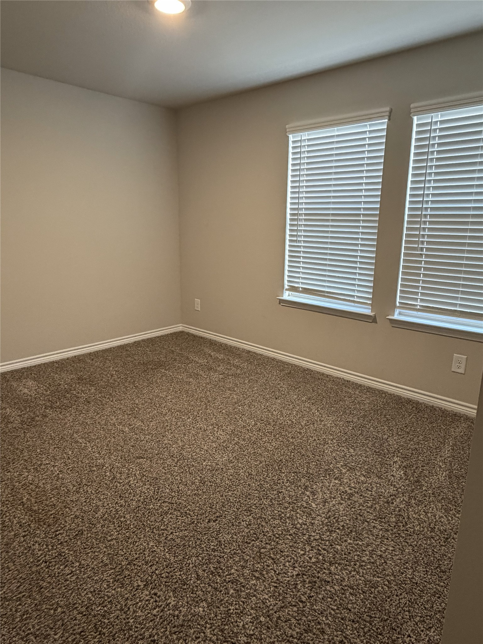 610 Legrand Street Brenham, TX 77833 - Photo 13 of 14 an empty room with a window