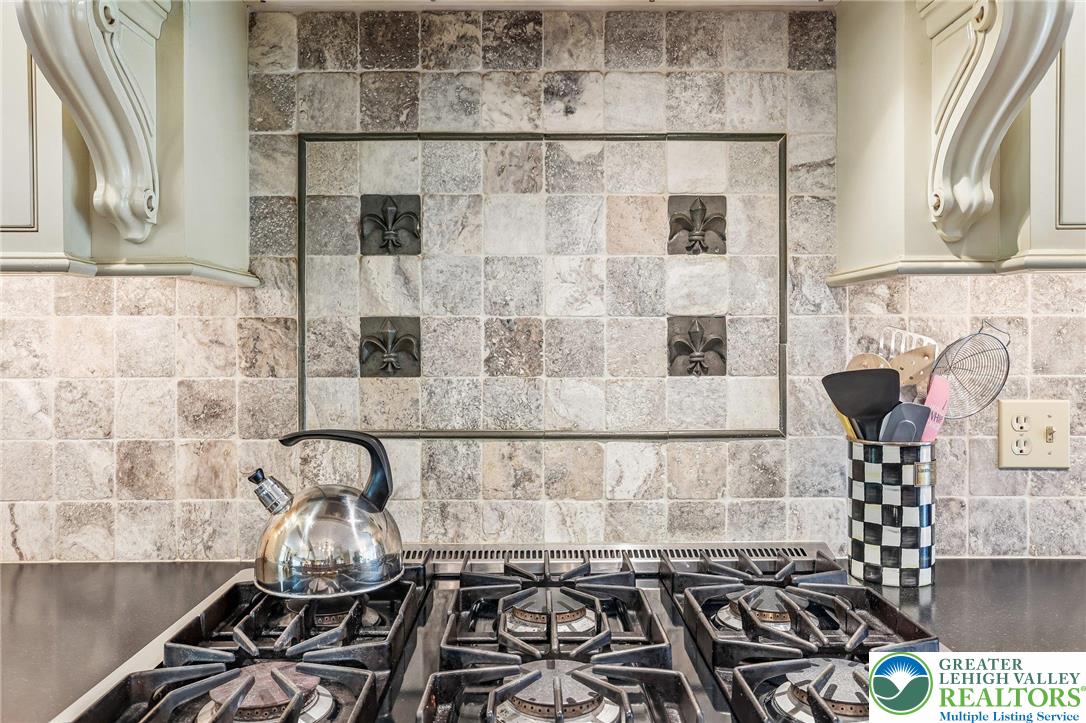 3811 Lilac Road Allentown, PA 18103 - Photo 33 of 74 Tile detail in chefs kitchen with 6 burner propane heat