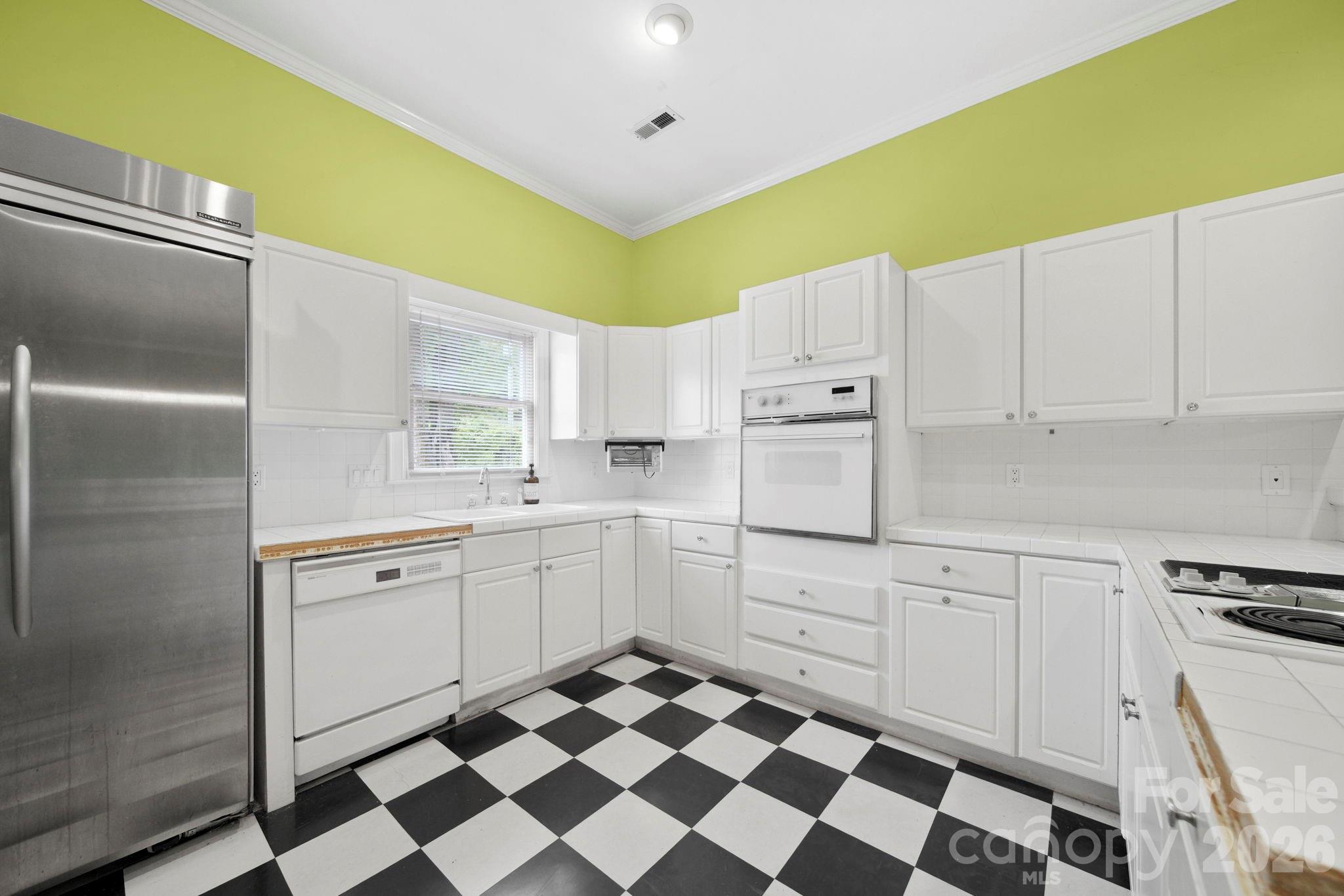 1109 Union Road Gastonia, NC 28054 - Photo 28 of 44 a kitchen with granite countertop cabinets and steel stainless steel appliances