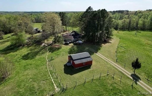2842 Rash Maddux Road Blackstone, VA 23824 - Photo 20 of 29 a view of a garden with lawn chairs