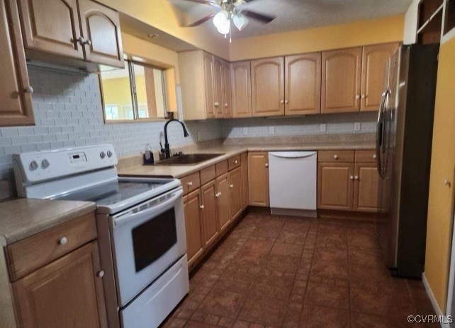 2842 Rash Maddux Road Blackstone, VA 23824 - Photo 7 of 29 a kitchen with stainless steel appliances granite countertop a sink a stove and refrigerator