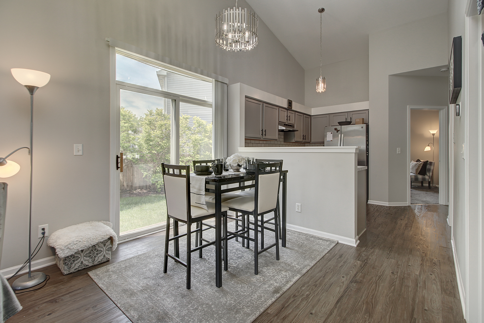 378 Reston Circle Romeoville, IL 60446 - Photo 5 of 17 a view of a dining room with furniture window and wooden floor