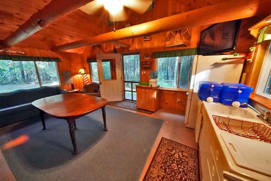 643 Sandy Beach Road Danforth, ME 04424 - Photo 21 of 48 living-area-camp-east-grand