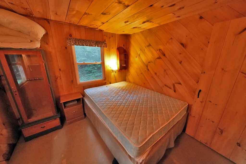 643 Sandy Beach Road Danforth, ME 04424 - Photo 24 of 48 maine-lake-camp-bedroom-2