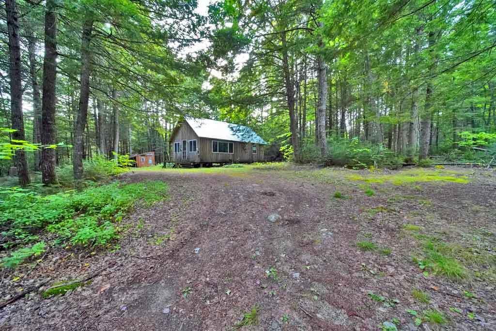 643 Sandy Beach Road Danforth, ME 04424 - Photo 10 of 48 cabin-lake-accee-east-grand