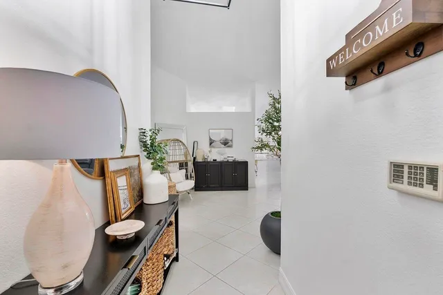 a kitchen with stainless steel appliances kitchen island granite countertop a sink and cabinets