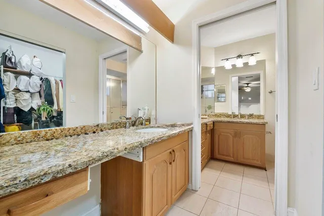 a bathroom with a bathtub a toilet and a shower