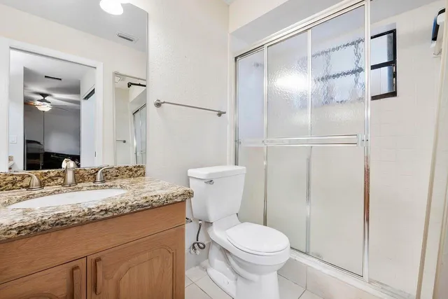 a view of a lake with a building in the background