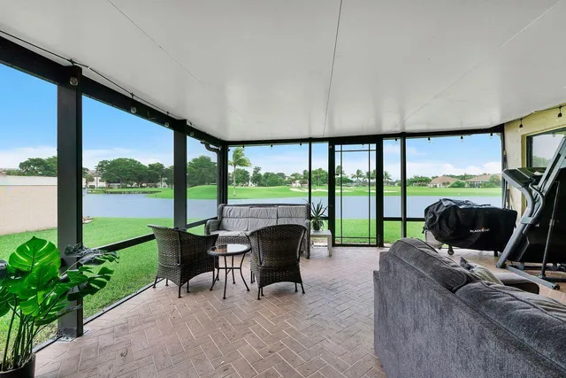 a view of a golf course with a lake