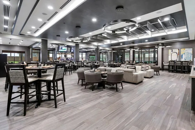 a view of house with outdoor space and parking