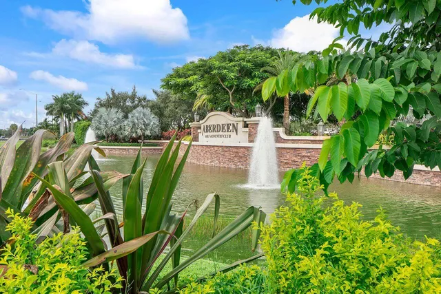 an aerial view of a city with ocean view