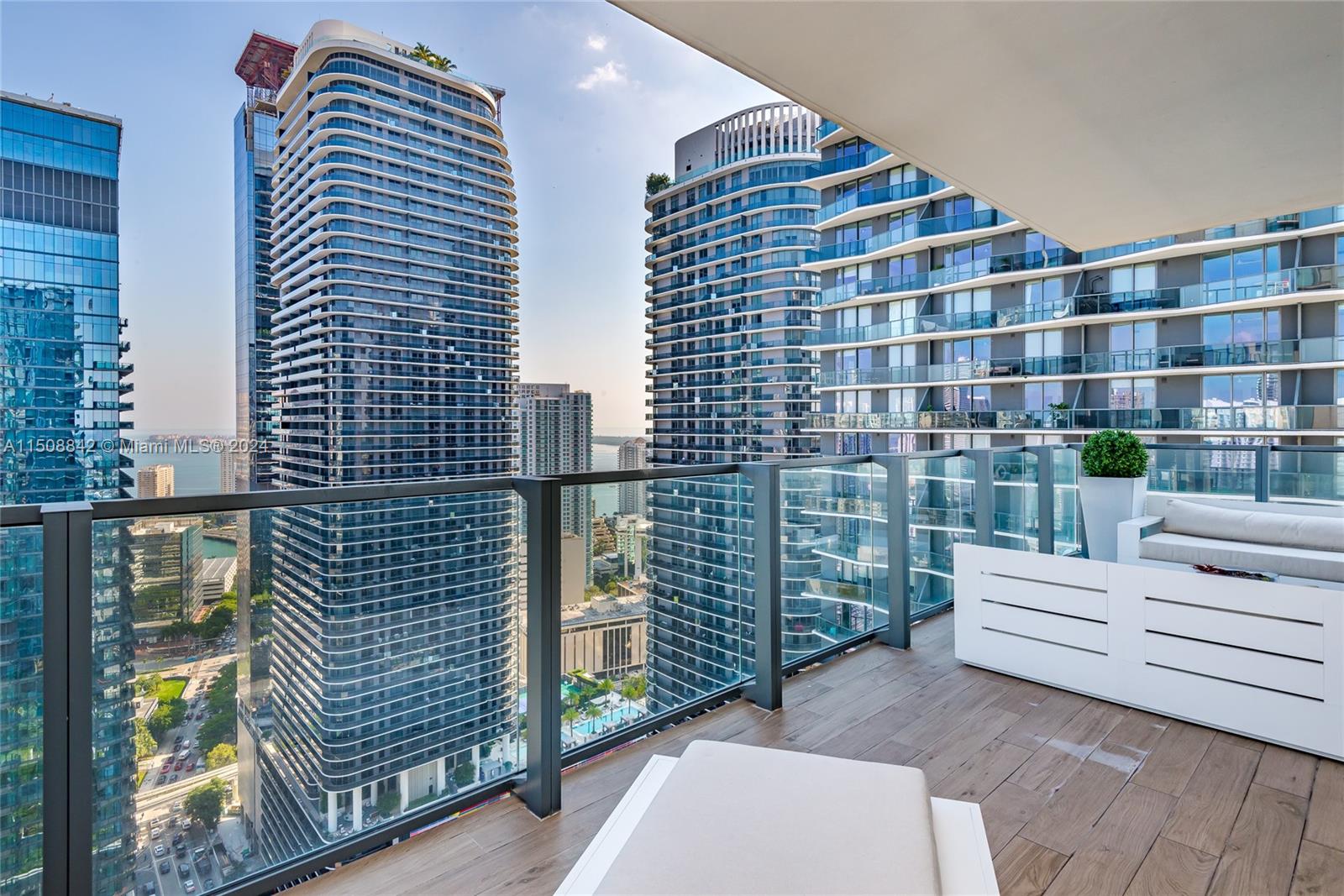 88 Southwest 7th Street, Unit 3301 Miami, FL 33130 - Photo 35 of 54 a view of building with an outdoor space