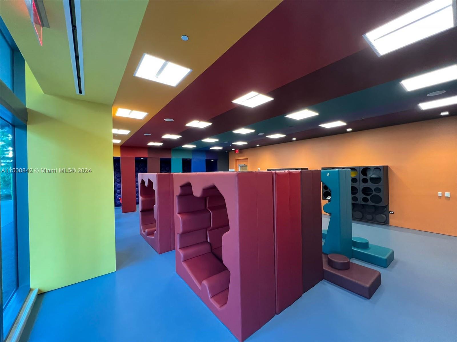 88 Southwest 7th Street, Unit 3301 Miami, FL 33130 - Photo 48 of 54 a view of a room with gym equipment