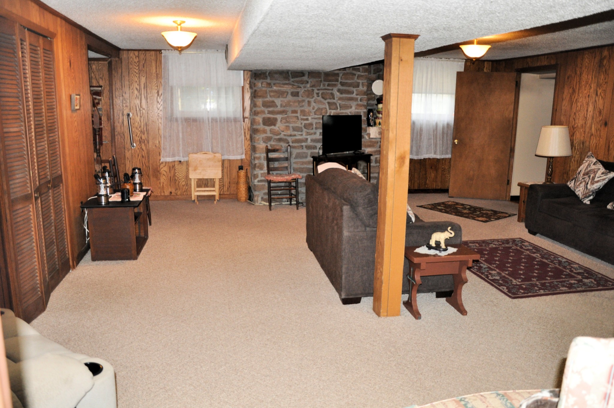 6353 Pettus Road Antioch, TN 37013 - Photo 12 of 21 Large Den 22 x 24 ft. has rock chimney/ insert for wood stove - lower level