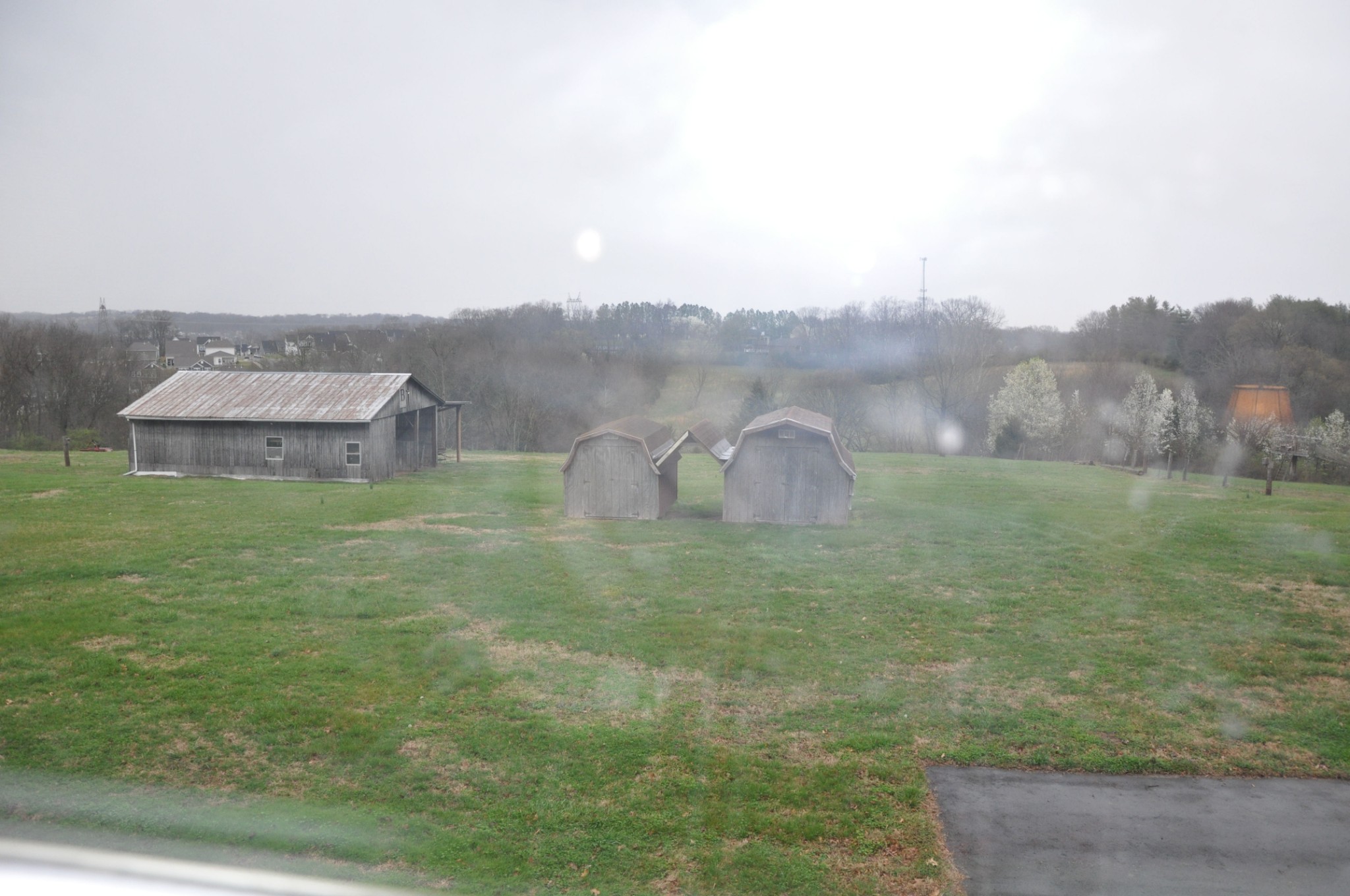 View of acreage looking thru Florida Room windows