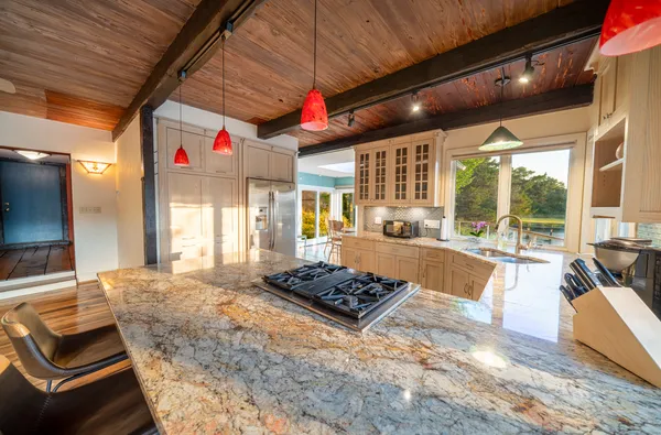 a view of a dining room with furniture wooden floor and garden