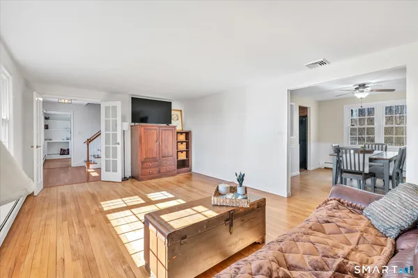 a living room with furniture and a table