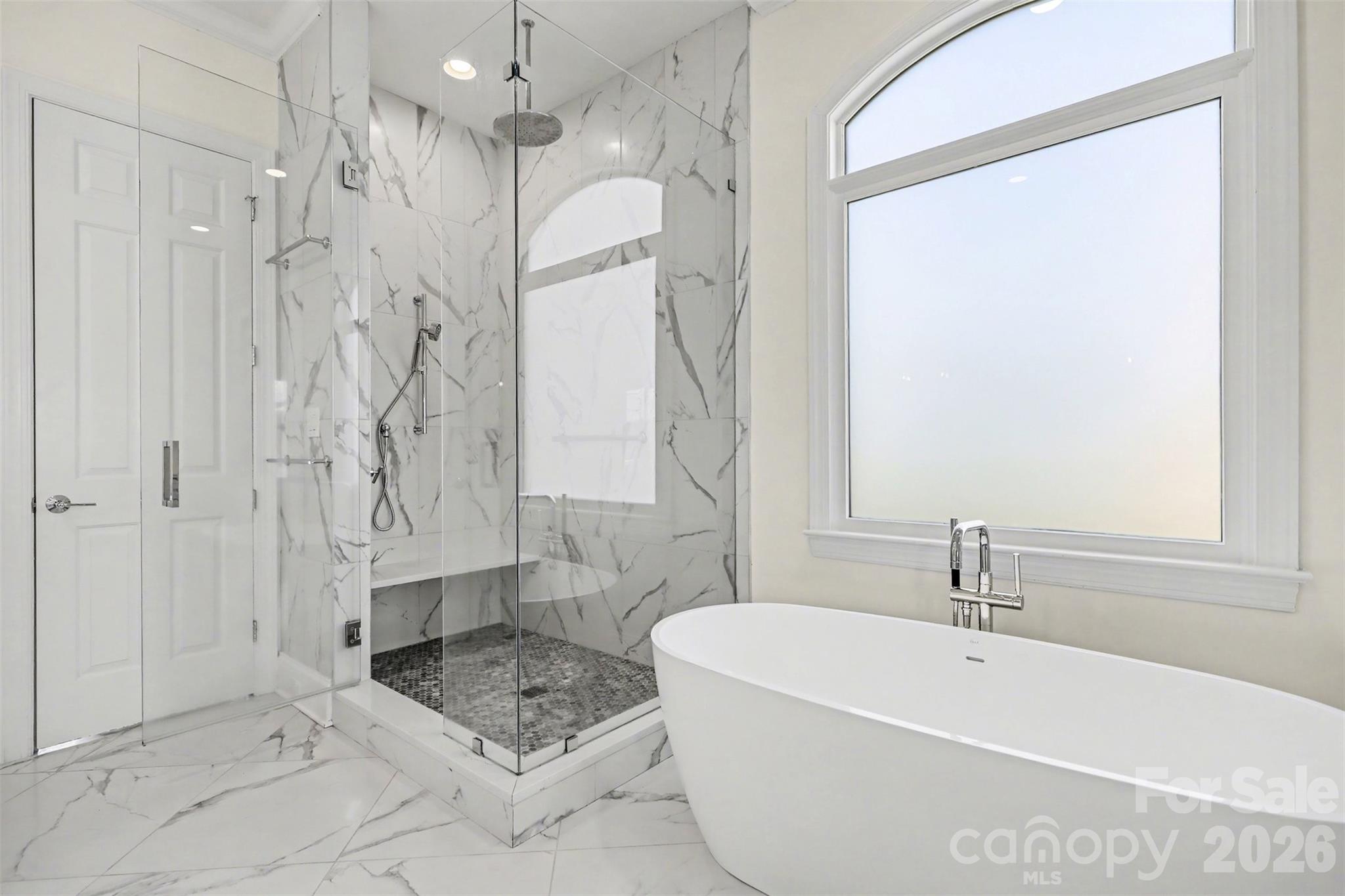 183 Mayfair Road Mooresville, NC 28117 - Photo 28 of 47 a bathroom with a bathtub and shower