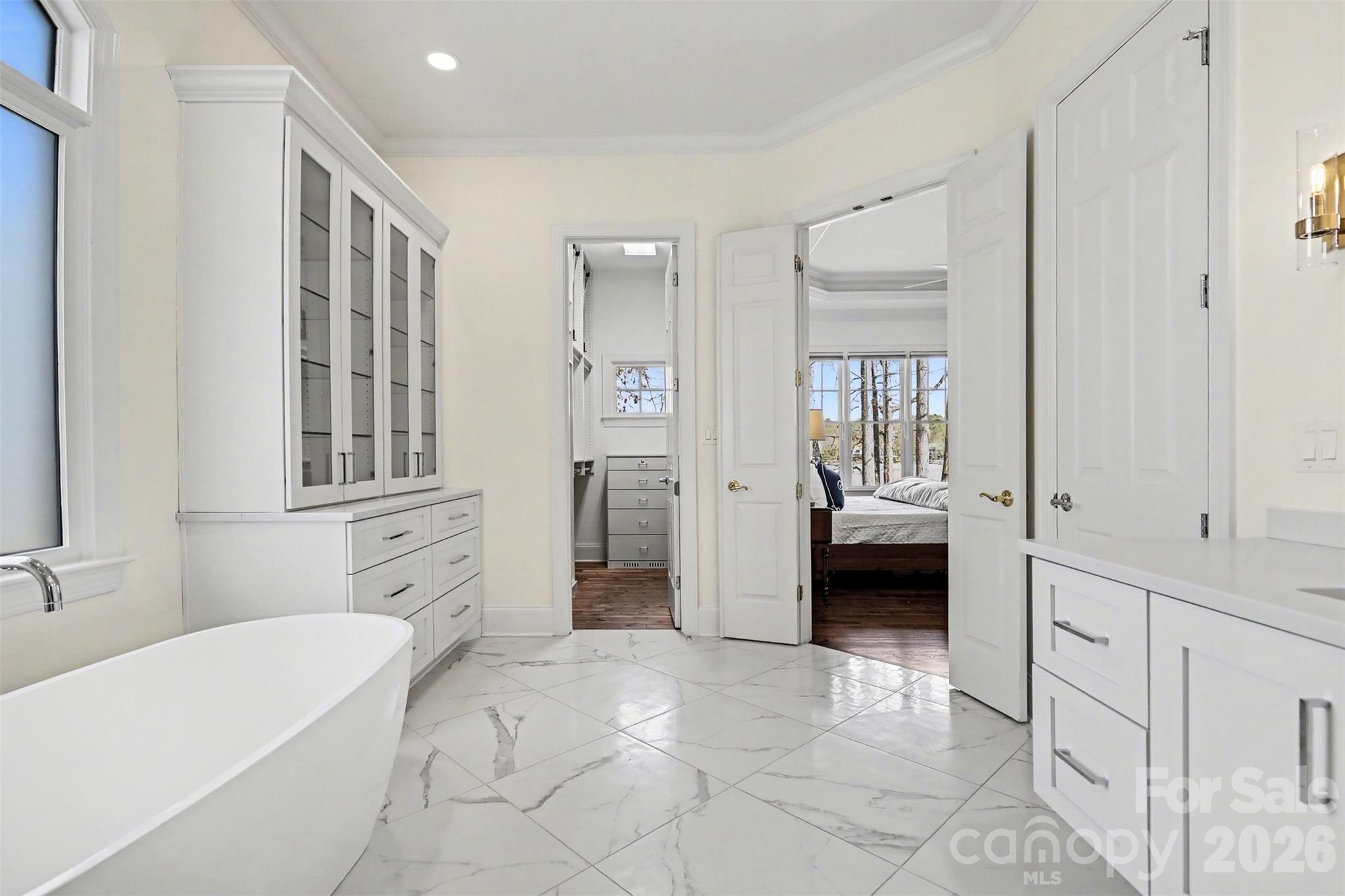 183 Mayfair Road Mooresville, NC 28117 - Photo 29 of 47 a en suite bathroom with a tub sink and mirror