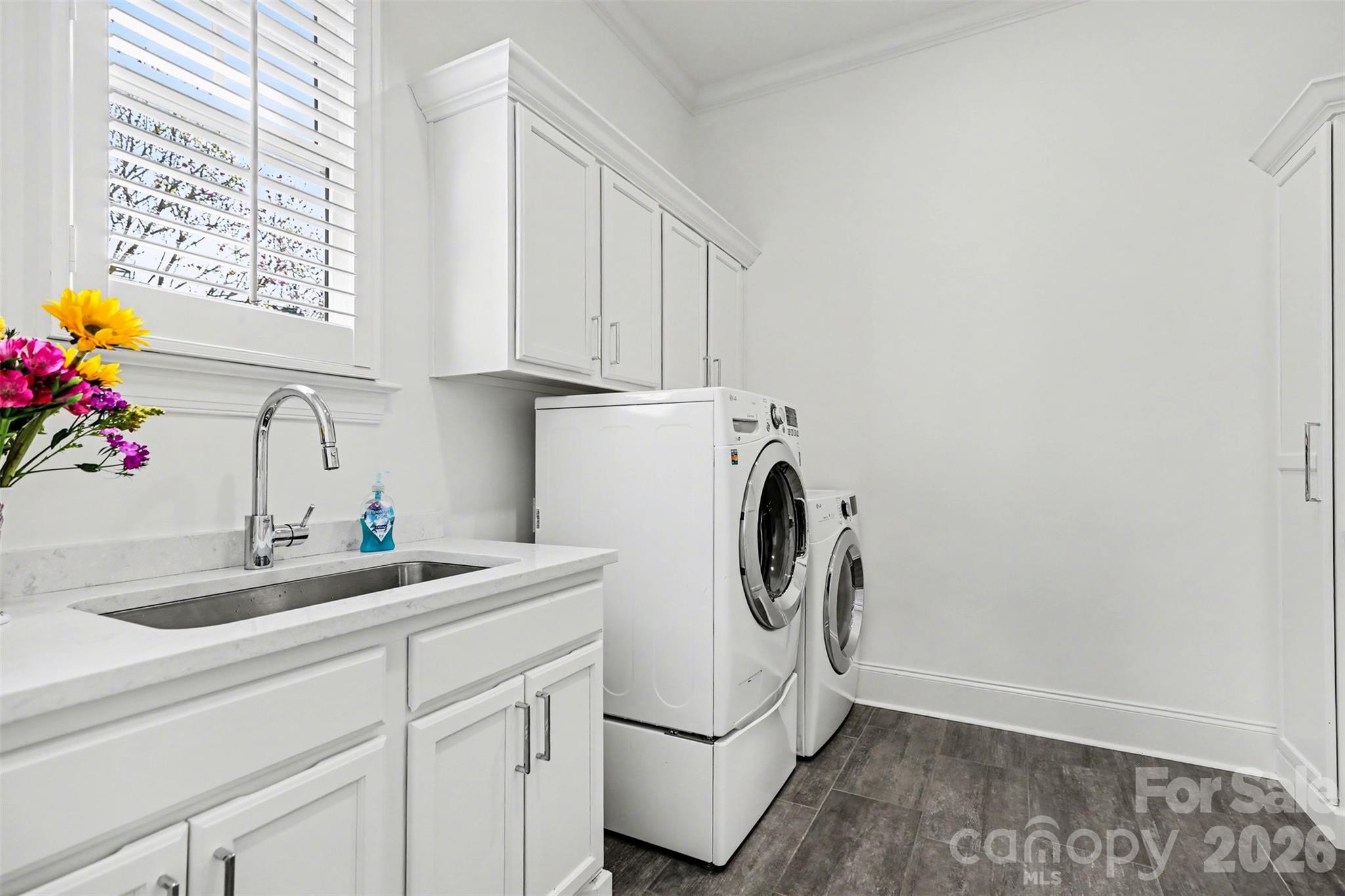 183 Mayfair Road Mooresville, NC 28117 - Photo 31 of 47 a utility room with sink dryer and washer