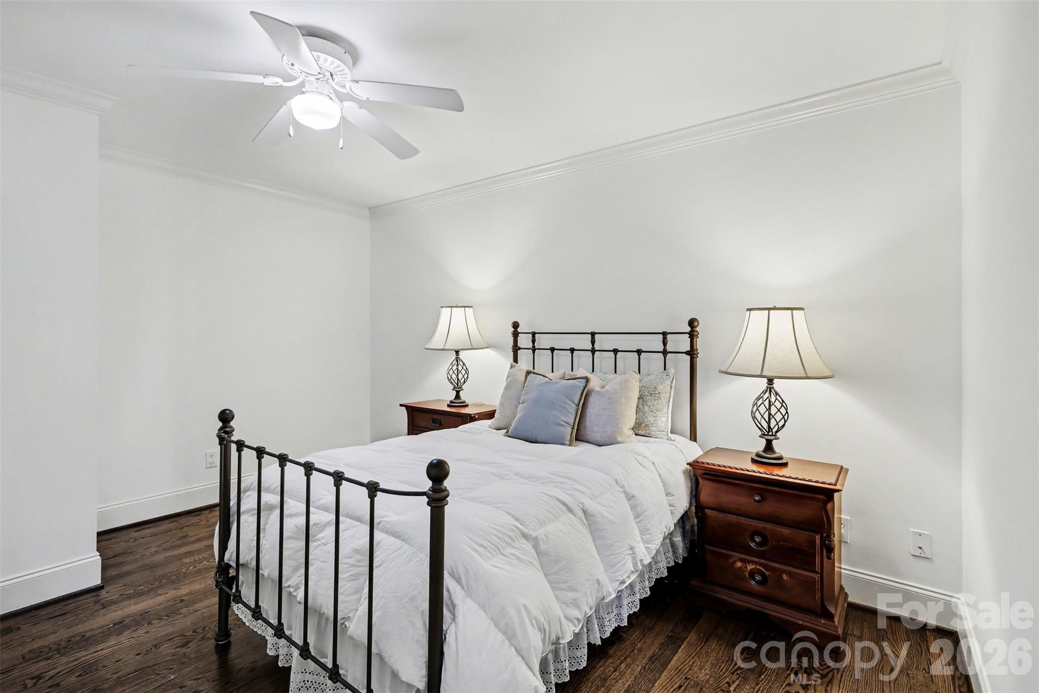 183 Mayfair Road Mooresville, NC 28117 - Photo 43 of 47 a bedroom with bed and a chandelier