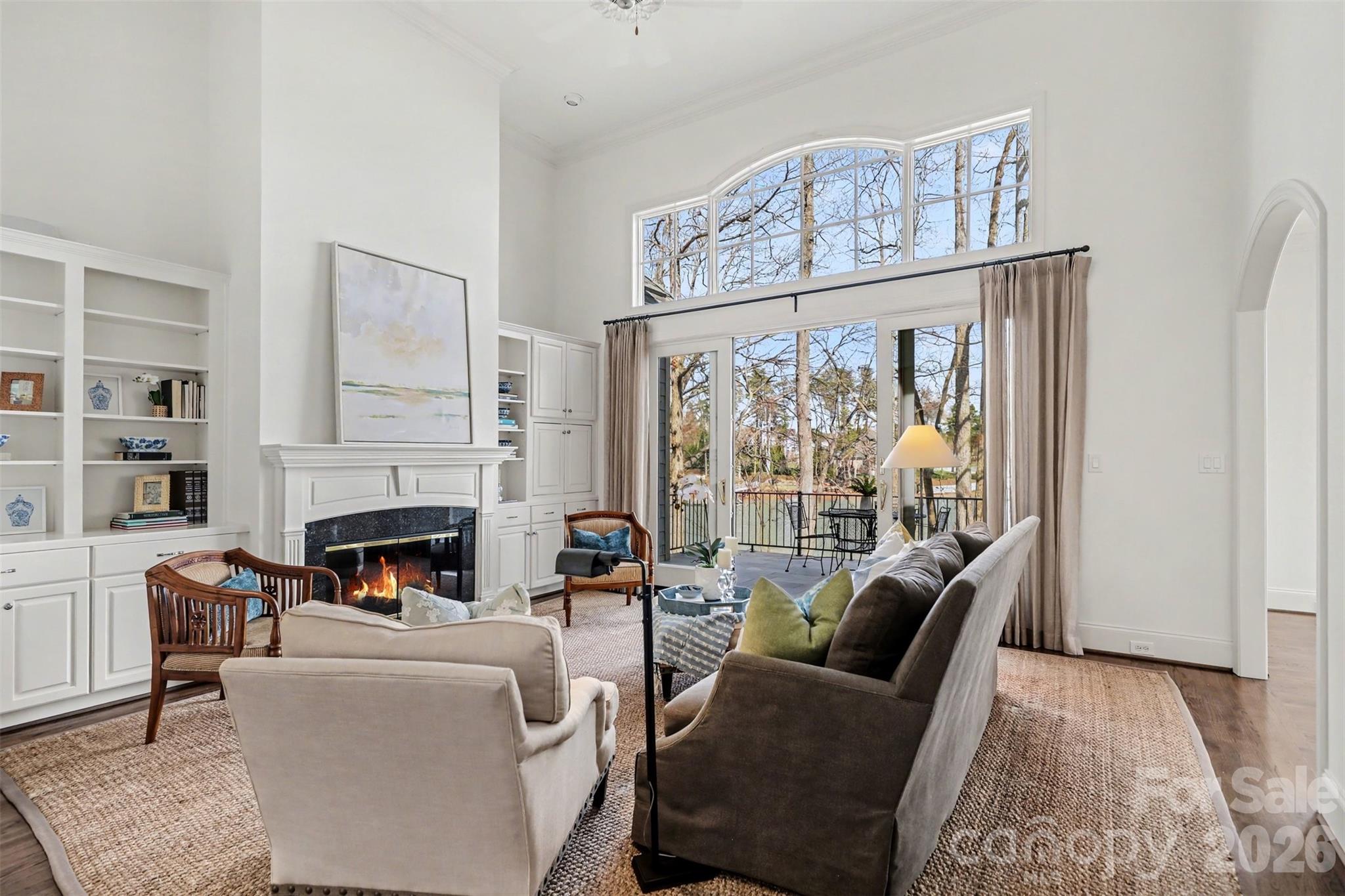 183 Mayfair Road Mooresville, NC 28117 - Photo 6 of 47 a living room with furniture large window and fireplace