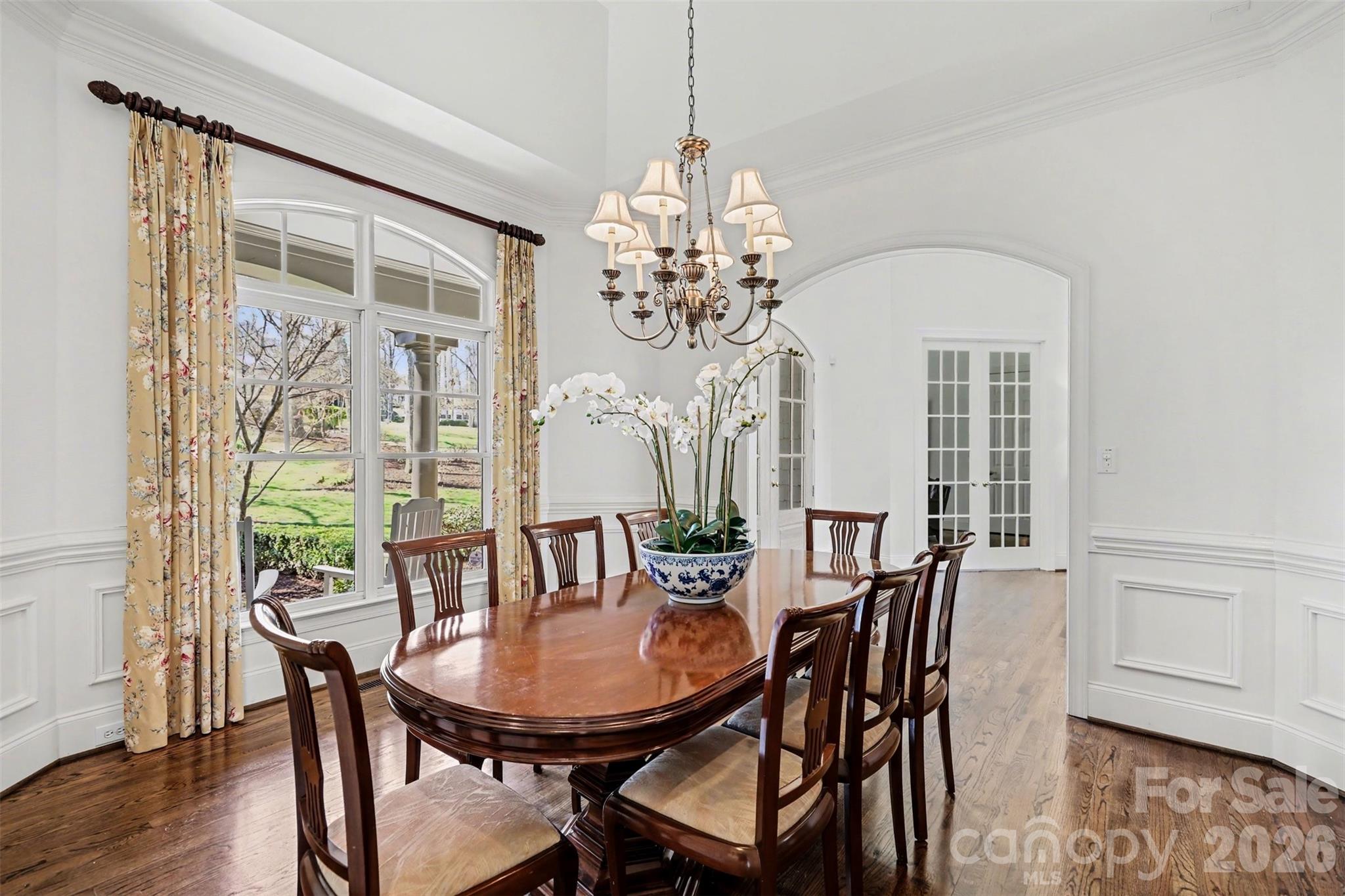 183 Mayfair Road Mooresville, NC 28117 - Photo 8 of 47 a view of a dining room with furniture window and wooden floor