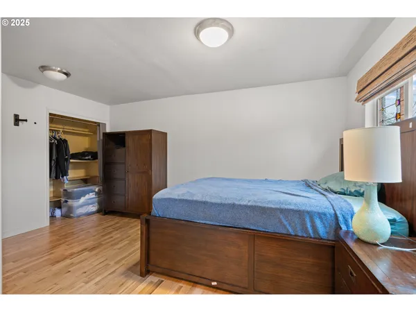 a kitchen with a refrigerator and a sink