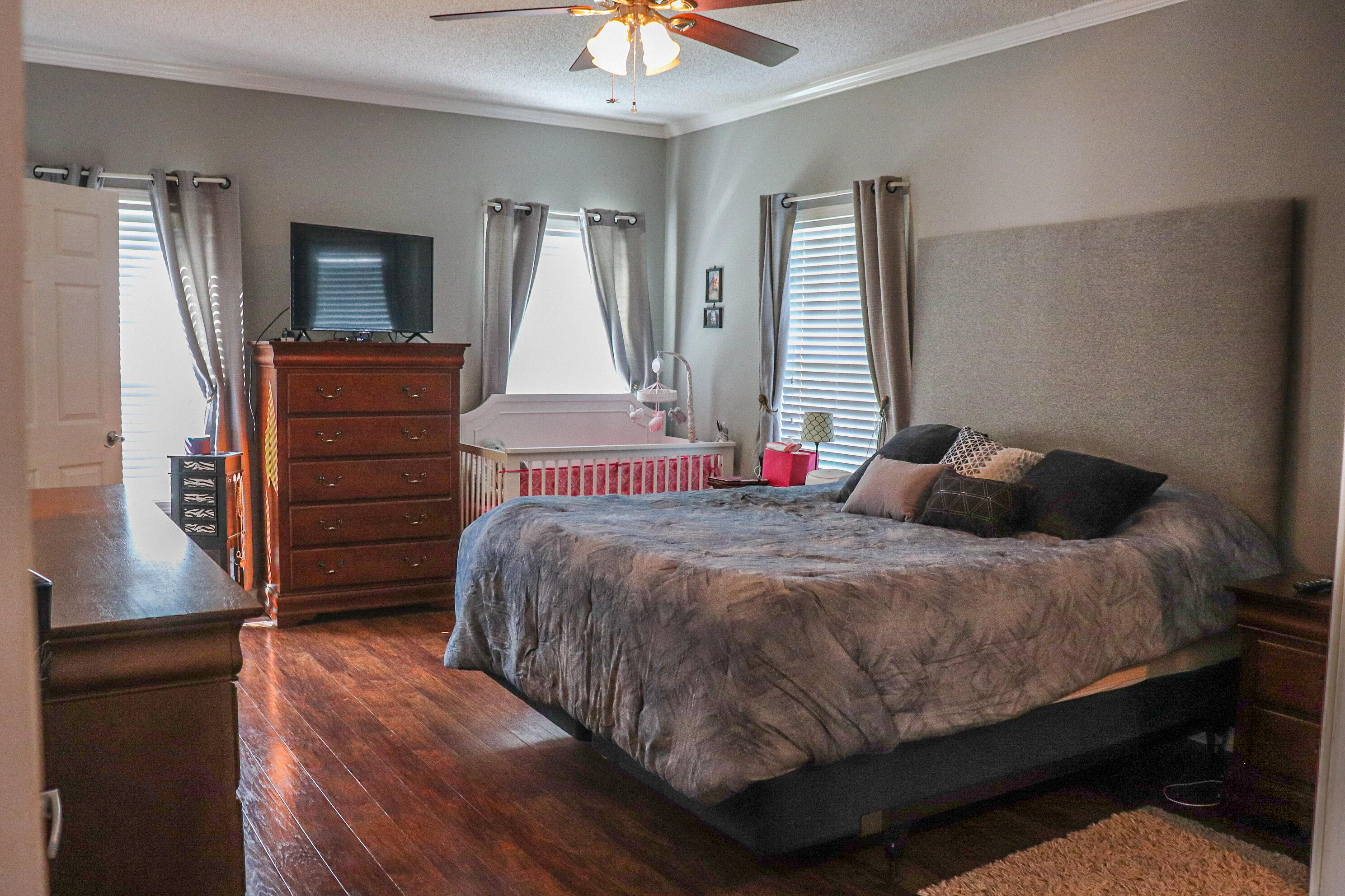 241 Sams Road Southeast Floyd, VA 24091 - Photo 12 of 28 a bedroom with a bed and a dresser