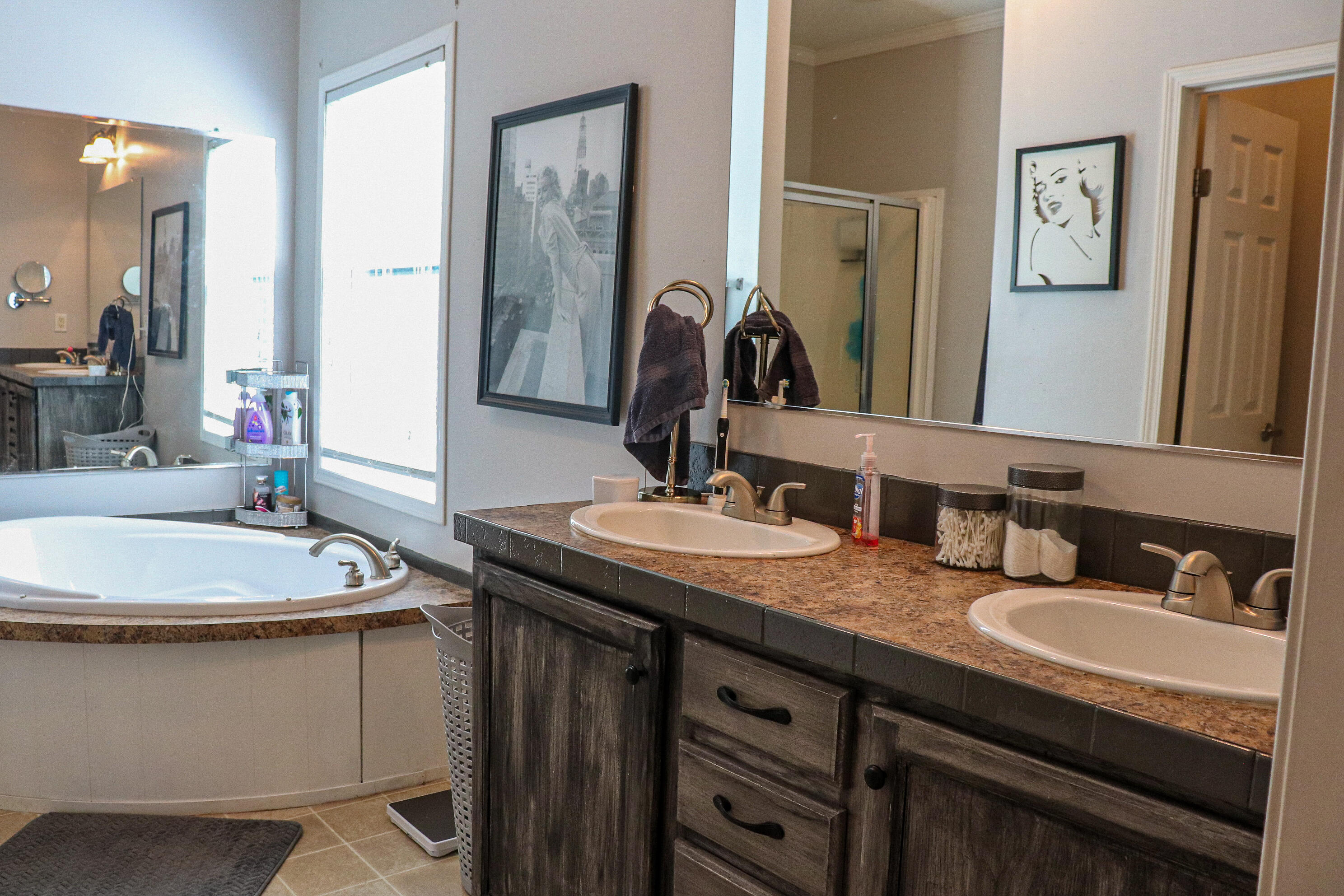 241 Sams Road Southeast Floyd, VA 24091 - Photo 15 of 28 a bathroom with a granite countertop sink and a mirror