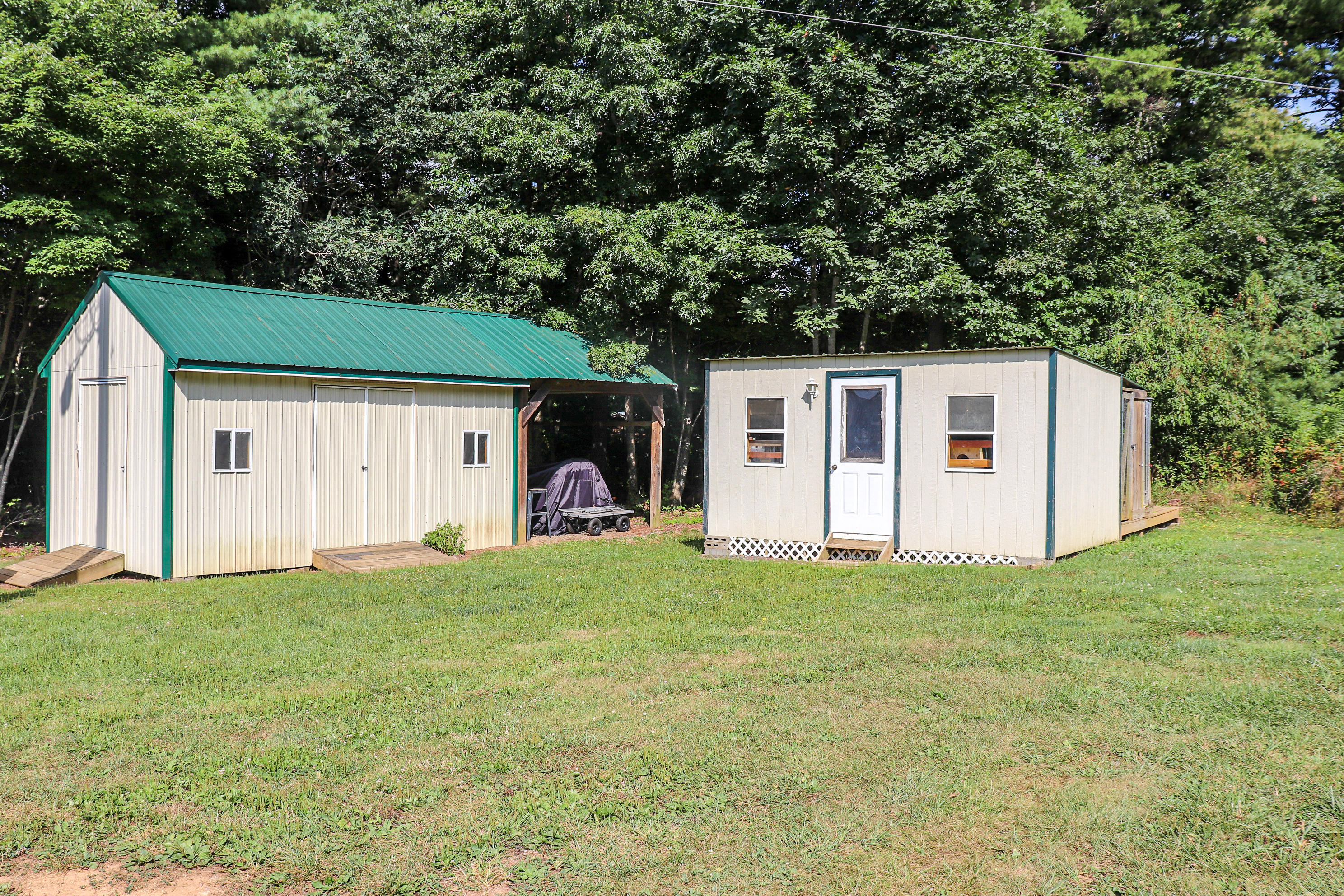 241 Sams Road Southeast Floyd, VA 24091 - Photo 22 of 28 a view of a yard in front of a house with large tree