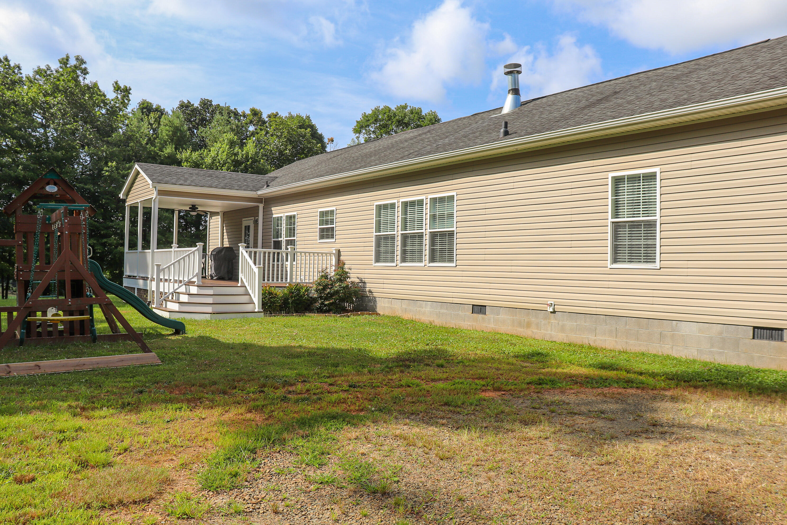 241 Sams Road Southeast Floyd, VA 24091 - Photo 4 of 28 a view of a house with backyard