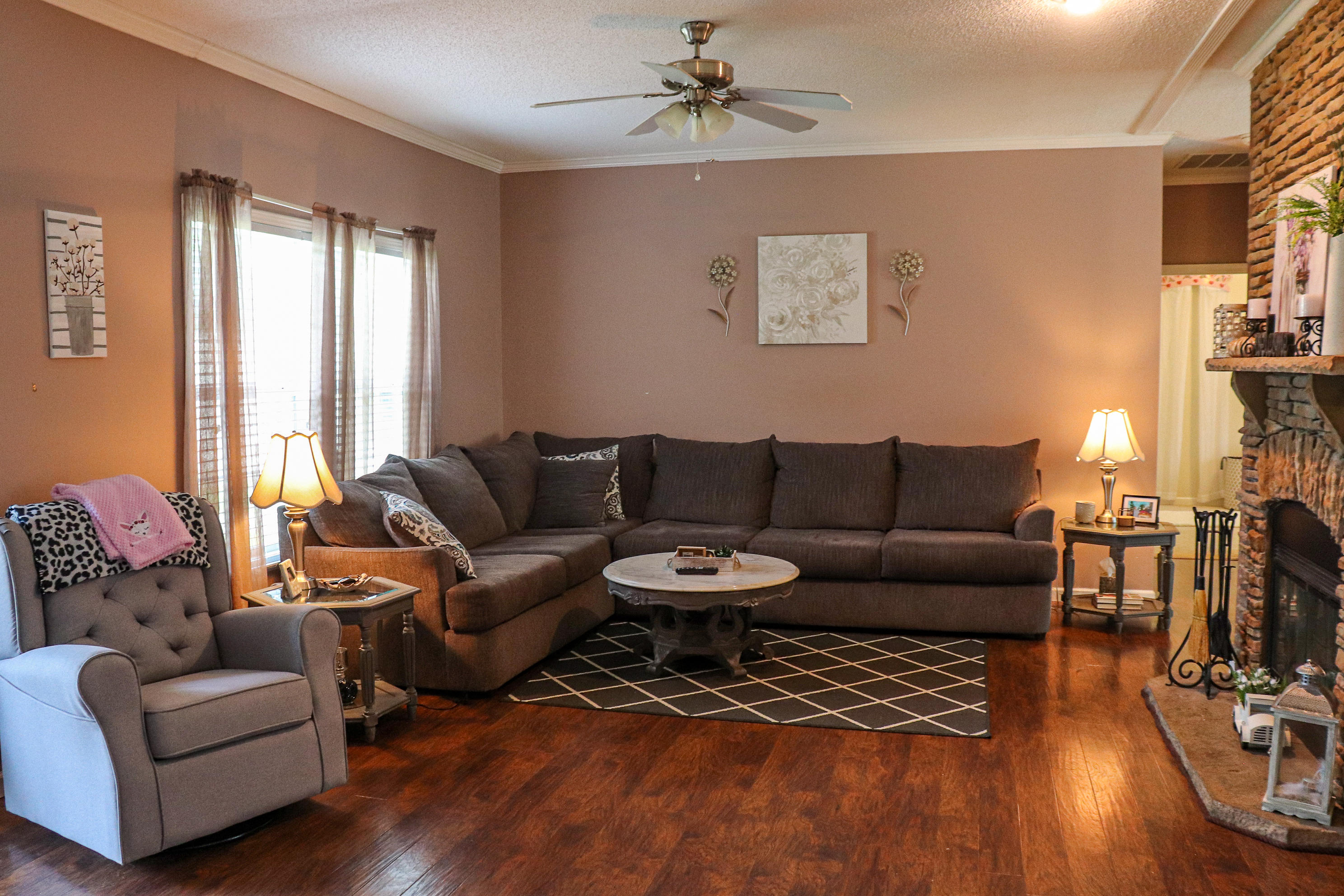 241 Sams Road Southeast Floyd, VA 24091 - Photo 7 of 28 a living room with furniture a fireplace and a large window
