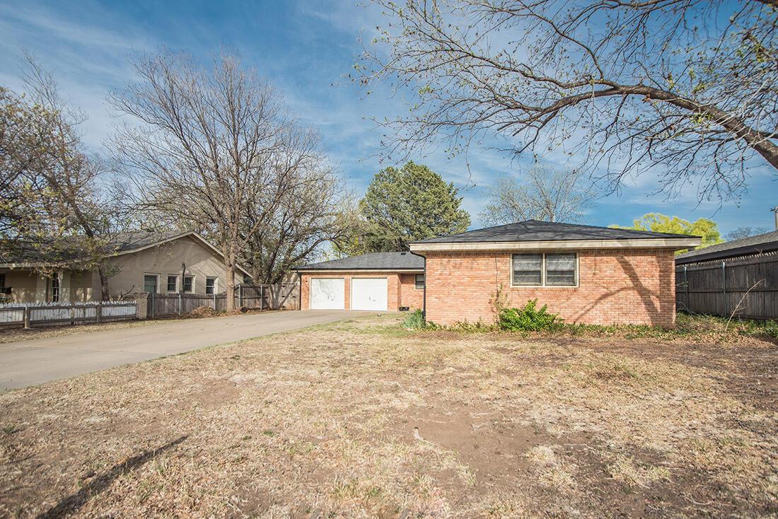 3609 Patterson Drive Amarillo, TX 79109 - Photo 2 of 21 front view of a house with a yard