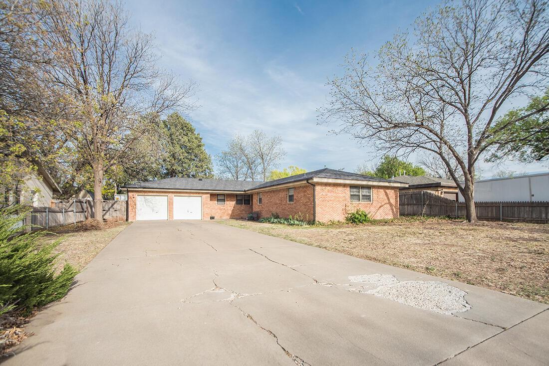 3609 Patterson Drive Amarillo, TX 79109 - Photo 3 of 21 front view of a house with a yard
