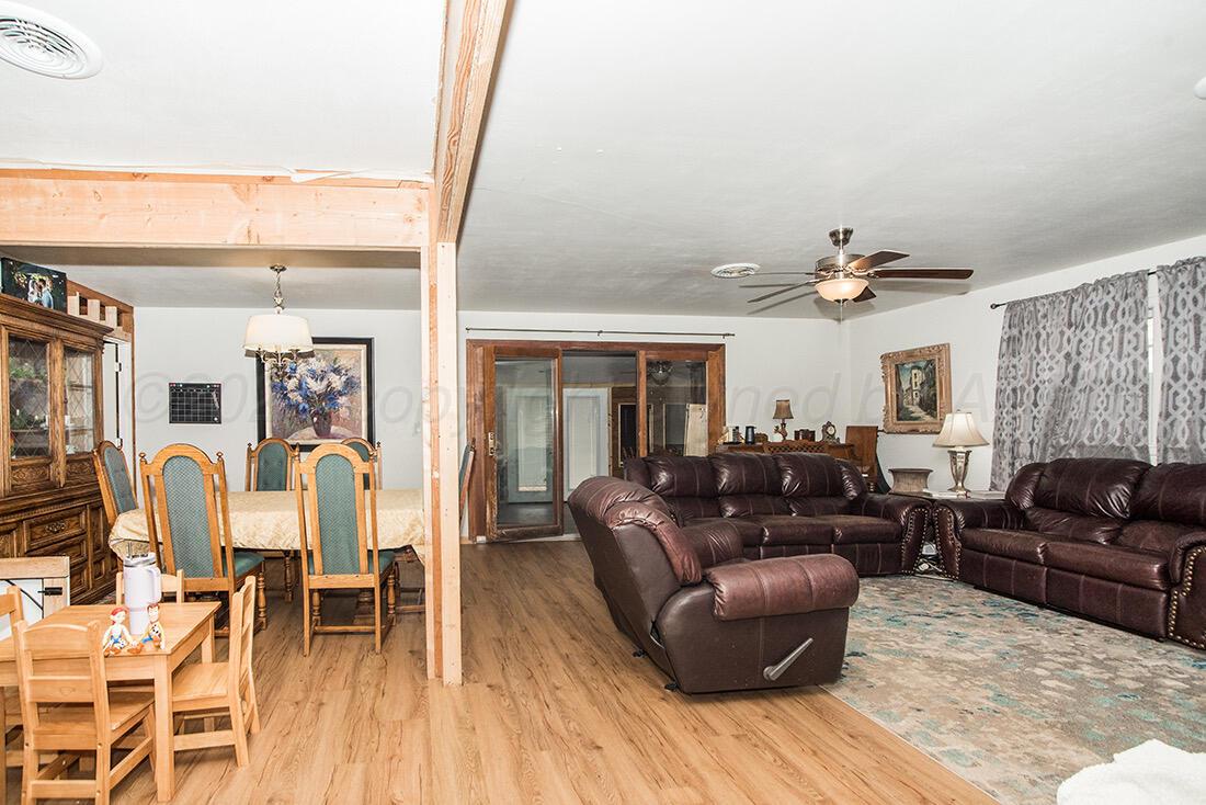 3609 Patterson Drive Amarillo, TX 79109 - Photo 7 of 21 a living room with furniture and a large window