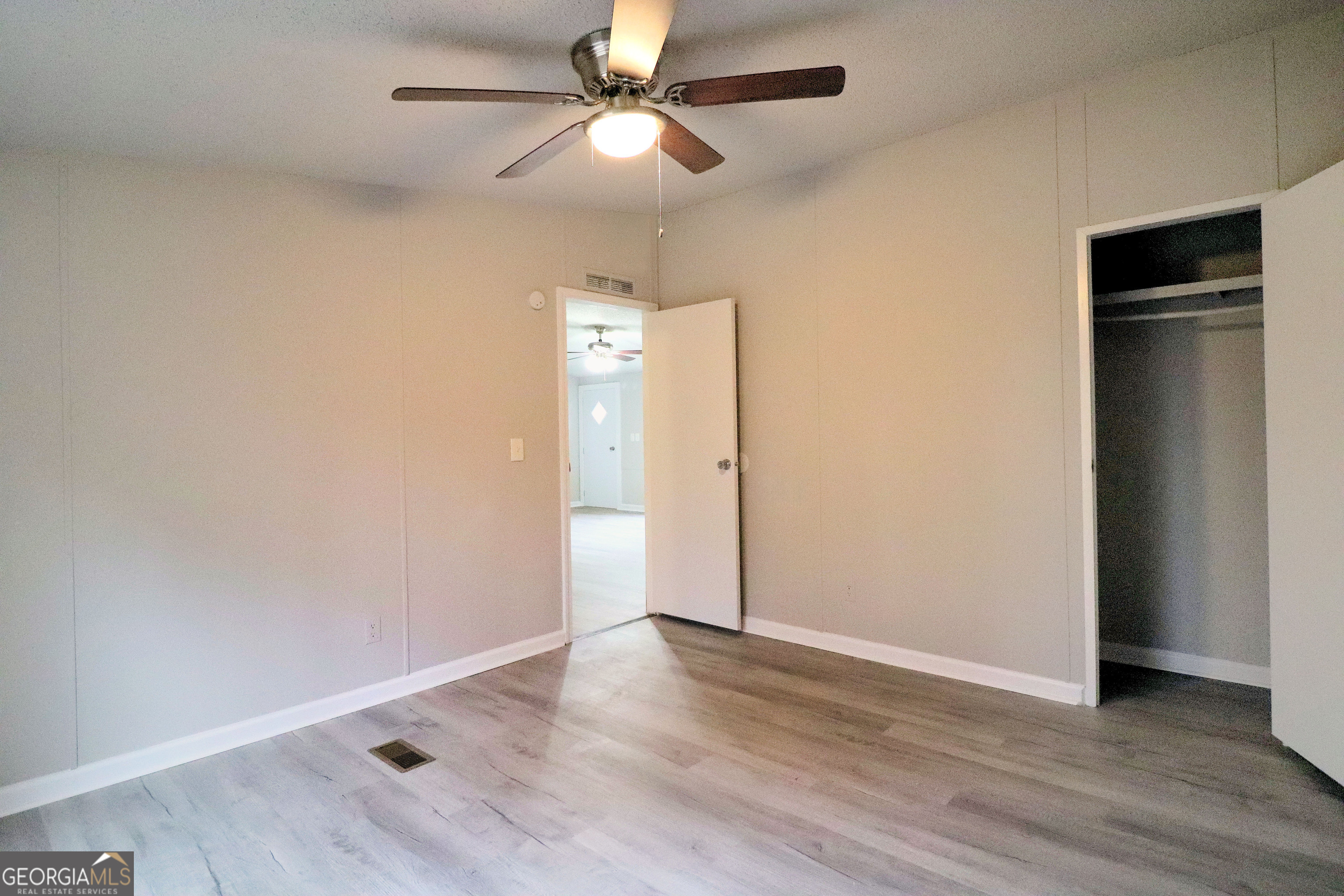 2200 Ridgeside Drive Villa Rica, GA 30180 - Photo 30 of 32 wooden floor in an empty room