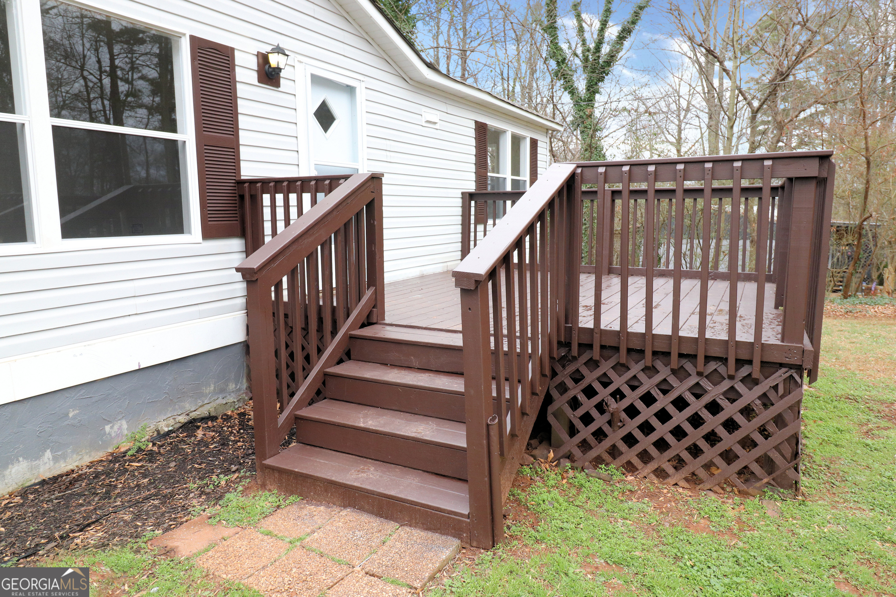 2200 Ridgeside Drive Villa Rica, GA 30180 - Photo 4 of 32 a view of a house with wooden fence