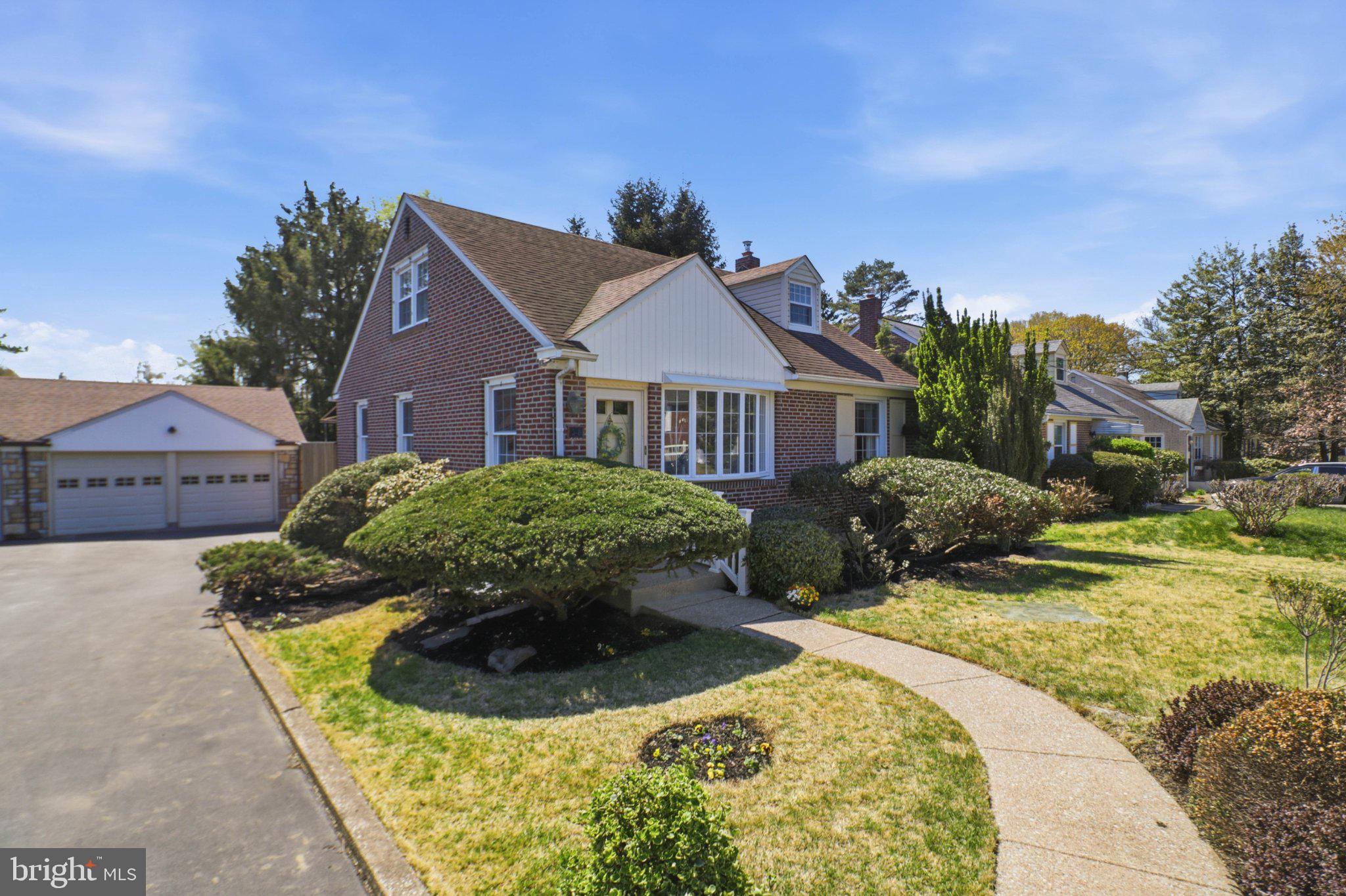 348 Valley View Road Springfield, PA 19064 - Photo 27 of 32 Charming brick home with lush landscaping.