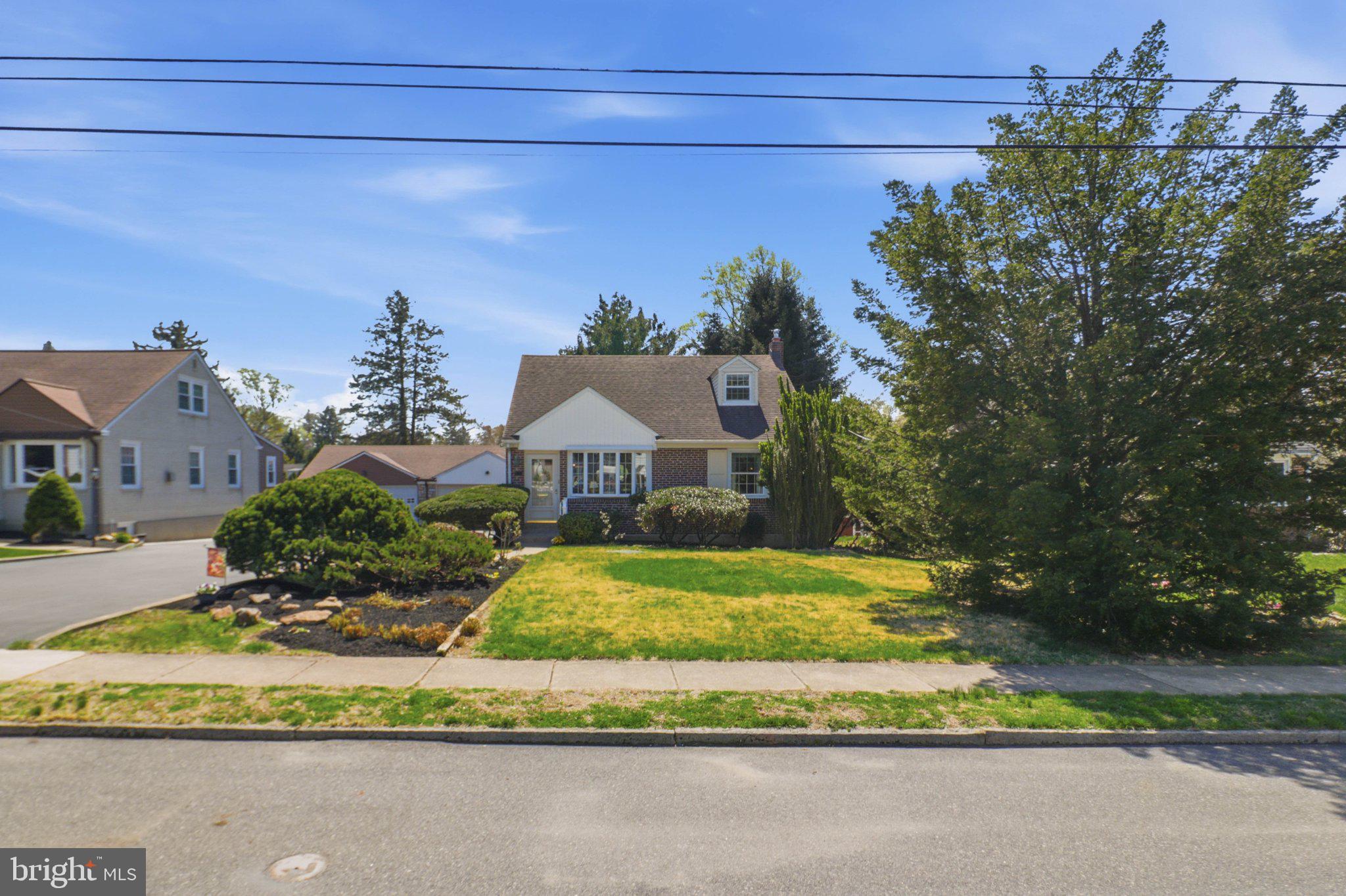 348 Valley View Road Springfield, PA 19064 - Photo 28 of 32 Charming home with lush greenery.