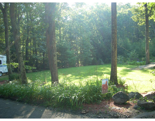 73 Pine Ridge Road Montgomery, MA 01085 - Photo 4 of 17 a view of a garden from a living room