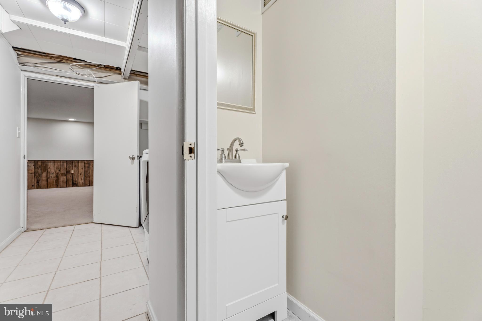 7037 Heathfield Road Baltimore, MD 21212 - Photo 36 of 44 lower level half bath