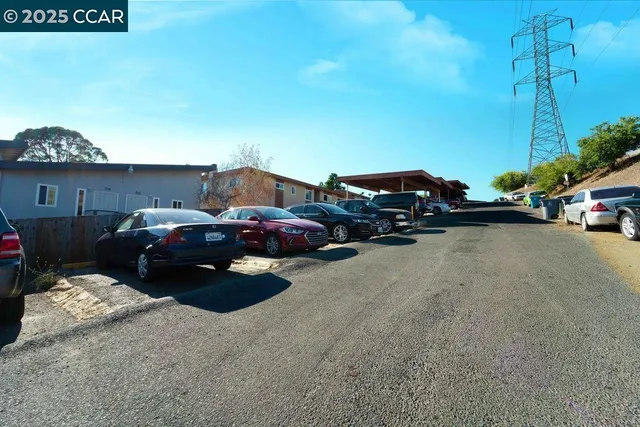 a couple of cars parked in a parking lot